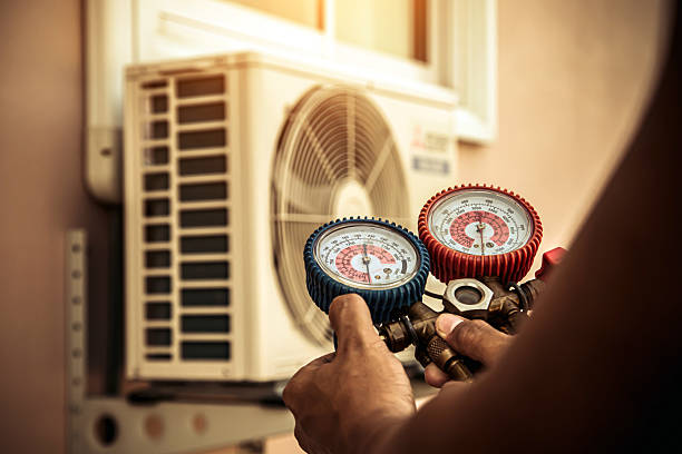 Professional Air Conditioning Service technician working in Lafayette, IN
